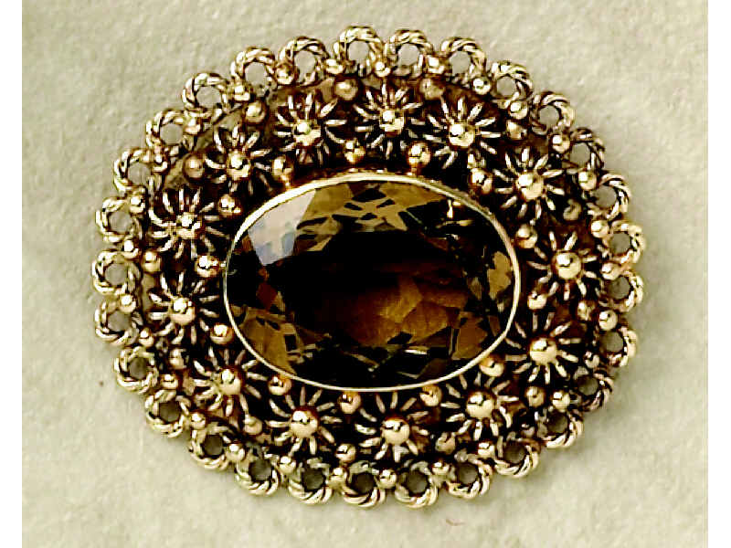 Appraisal: CITRINE BROOCH k yellow gold brooch set with one oval