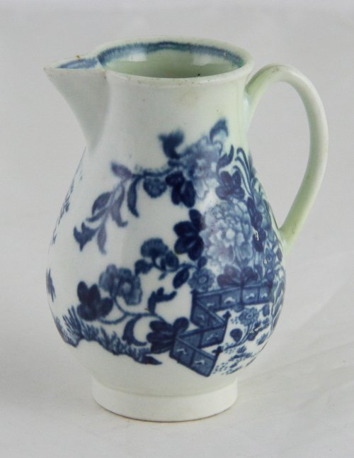 Appraisal: A Dr Wall sparrow beak cream jug transfer printed garden