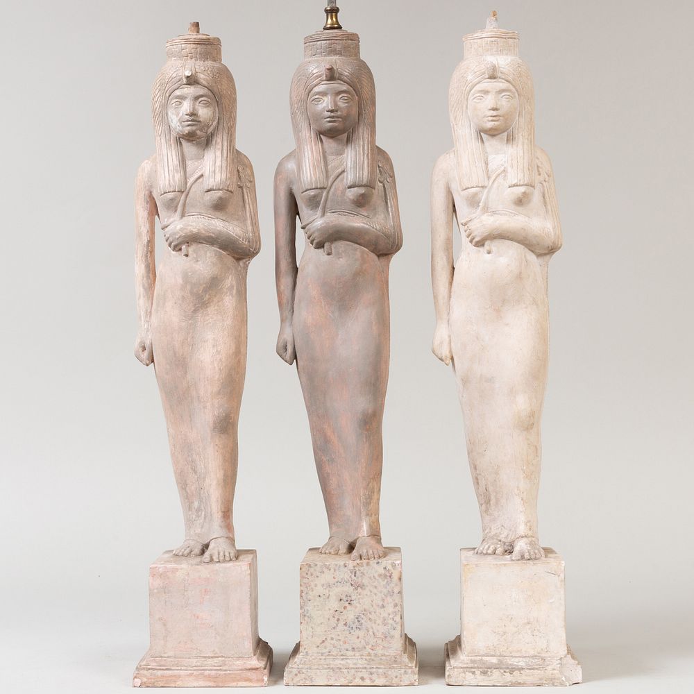 Appraisal: Three Egyptian Revival Style Plaster Lamp Bases One with electrical