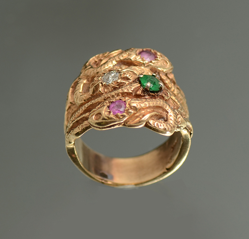 Appraisal: K SNAKE RING Yellow gold snake ring contains one round