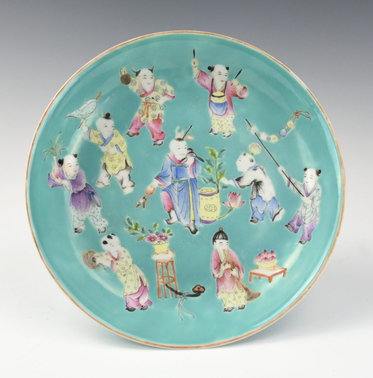 Appraisal: CHINESE TURQUOISE GROUND FAMILLE ROSE PLATE Chinese th C Nine