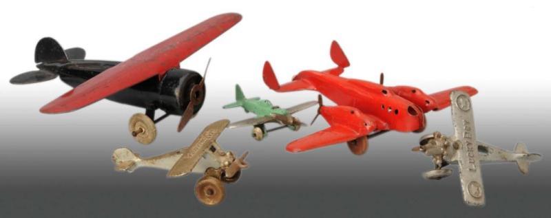 Appraisal: Lot of Cast Iron Pressed Steel Airplane Toys Description Includes