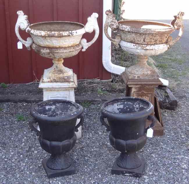 Appraisal: Pair th c cast iron urns As found '' Ht