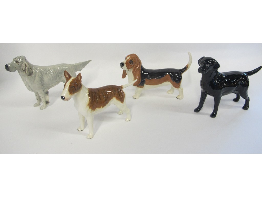 Appraisal: Four Beswick dogs including Basset Hound English Setter Bayldone Baronet