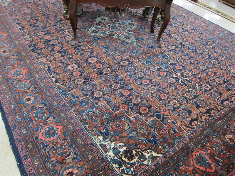 Appraisal: SEMI-ANTIQUE PERSIAN MEHRIBAN CARPET hand knotted in an Herati floral