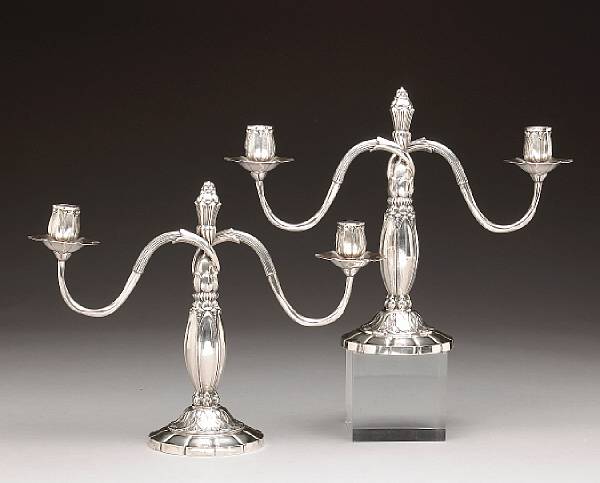 Appraisal: A sterling pair of two light candelabra in the Jensen