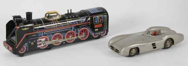 Appraisal: A West German battery drawn toy racing car cm long