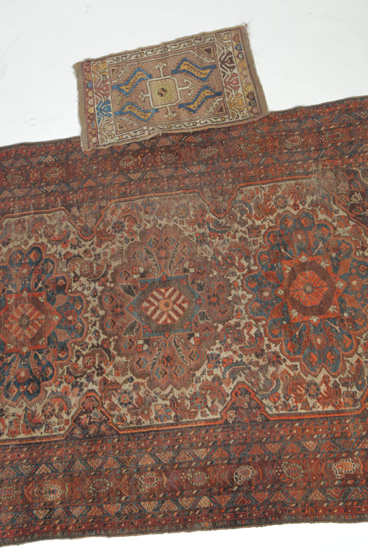 Appraisal: TWO ORIENTAL RUGS Persian and Caucasian late th-early th century