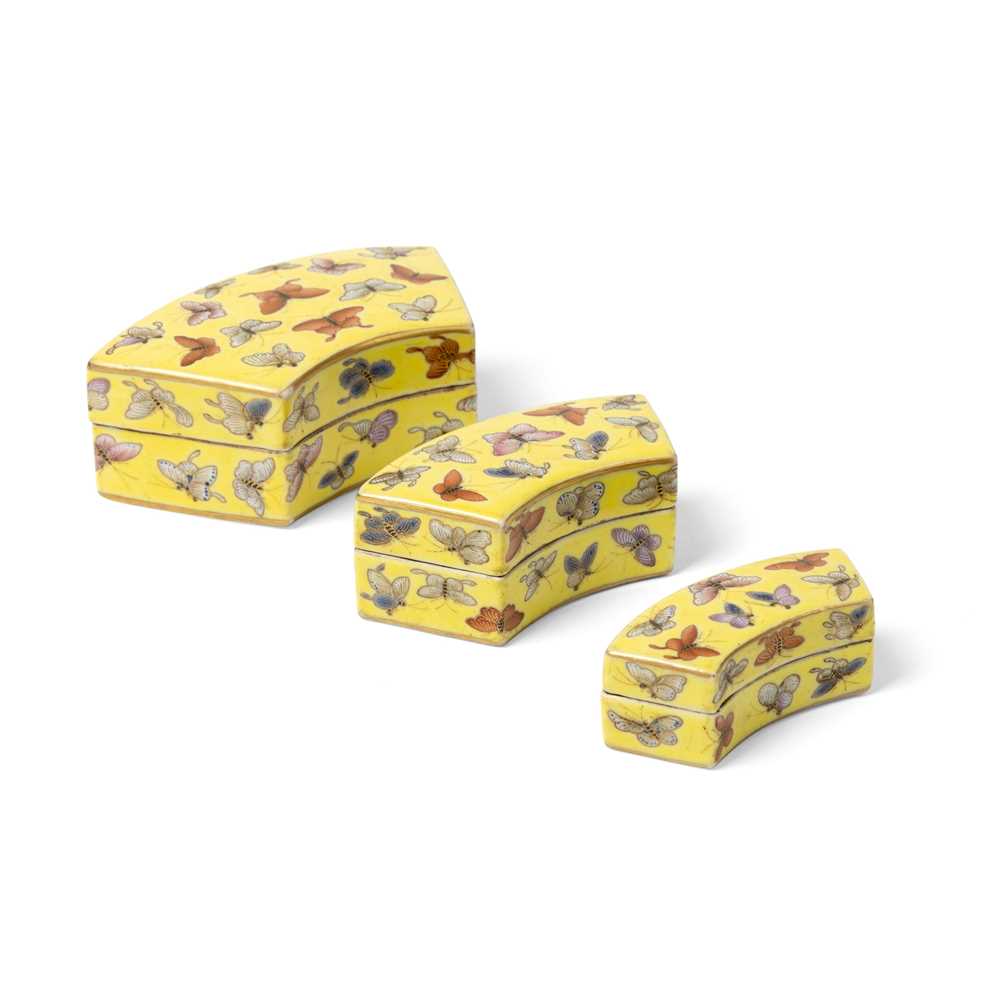 Appraisal: SET OF THREE YELLOW-GROUND FAMILLE ROSE 'BUTTERFLIES' FAN-SHAPED STACKING BOXES