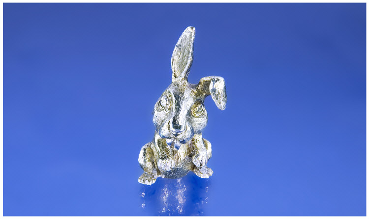 Appraisal: Stuart Devlin An amusing lop eared silver rabbit in begging