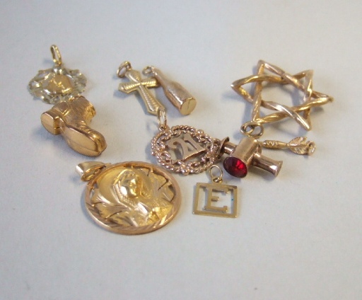 Appraisal: A group of ten pendants and charms including a Star