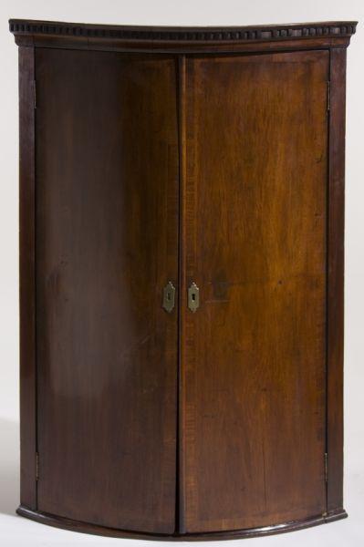 Appraisal: English Bowfront Hanging Corner Cupboard th c mahogany white pine