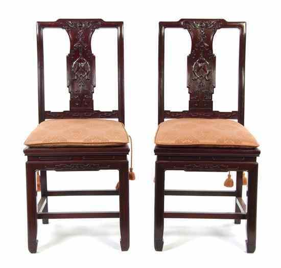 Appraisal: A Pair of Chinese Carved Hardwood Side Chairs the back