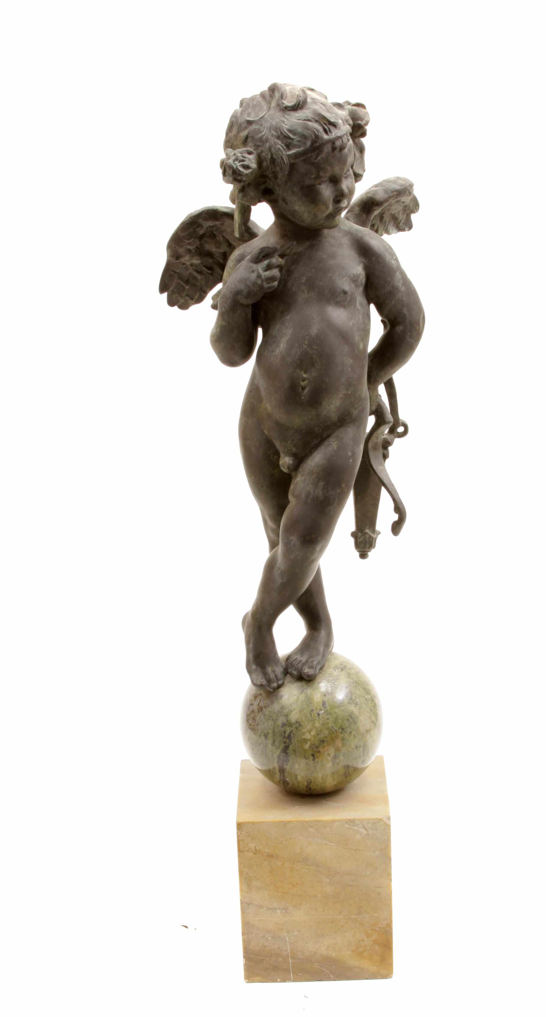 Appraisal: A pair of patinated bronze and marble figure of cherubs