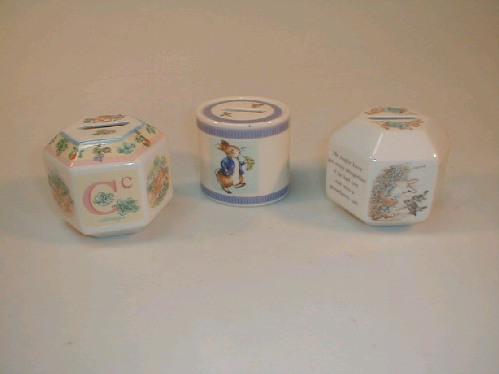 Appraisal: Three Wedgwood Peter Rabbit money boxes