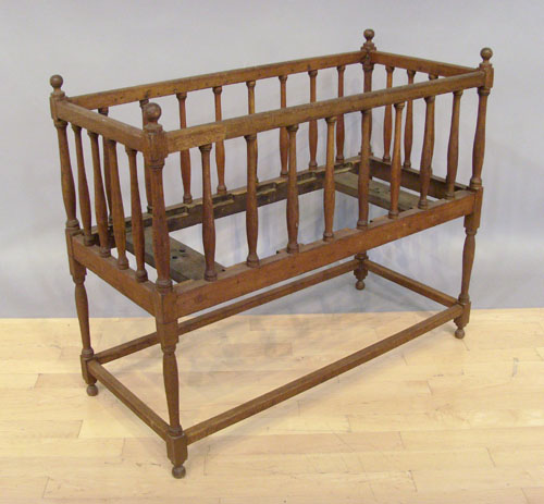 Appraisal: Turned walnut crib th c h w d