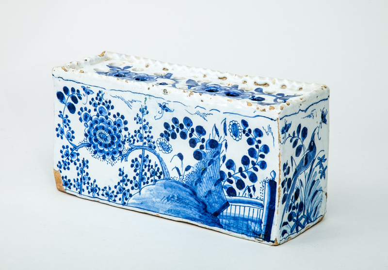 Appraisal: DUTCH BLUE AND WHITE DELFT FLOWER BRICK With garden views