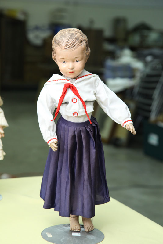 Appraisal: SCHOENHUT DOLL Wood jointed doll with carved hair intaglio eyes