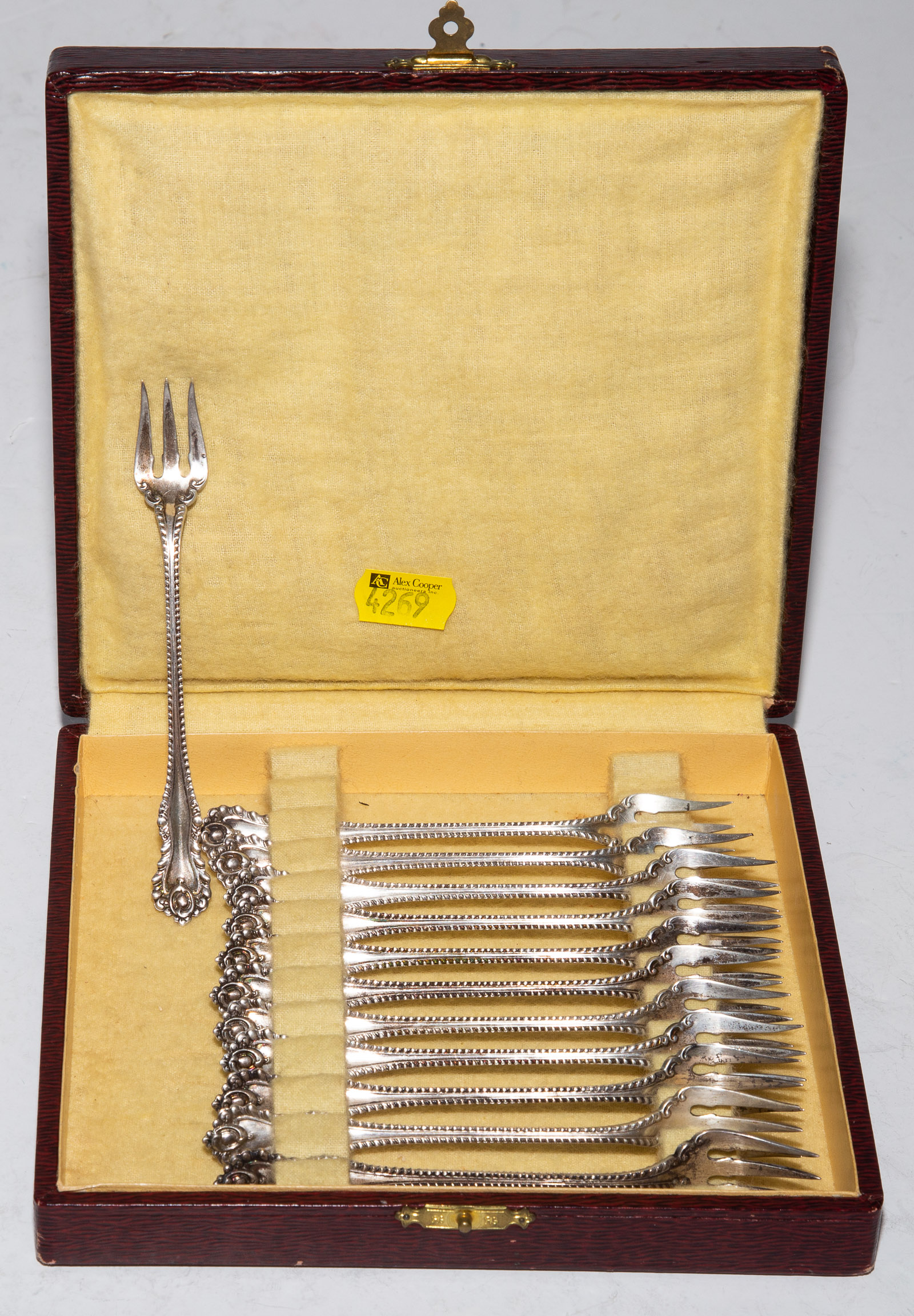 Appraisal: DOMINICK HAFF STERLING MAZARIN OYSTER FORKS In a fitted case