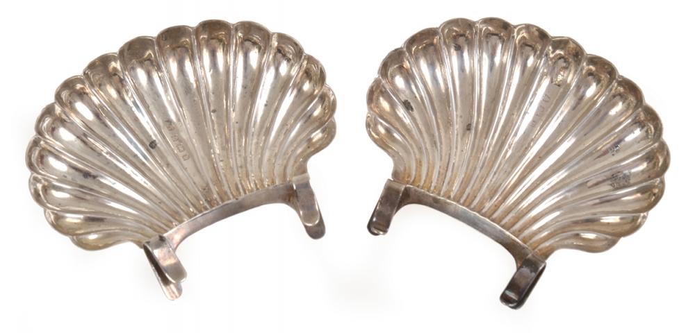 Appraisal: TWO SMALL STERLING SHELL SHAPED PLATE CLIPS