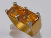 Appraisal: A French hallmarked carat gold citrine and diamond ring of