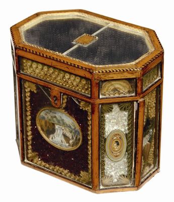 Appraisal: A George III rolled paper octagonal tea caddy the hinged