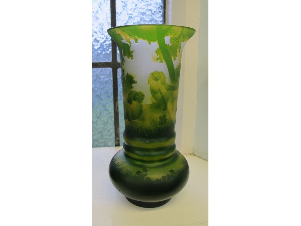 Appraisal: Modern green cameo glass vase decorated with two dogs amongst