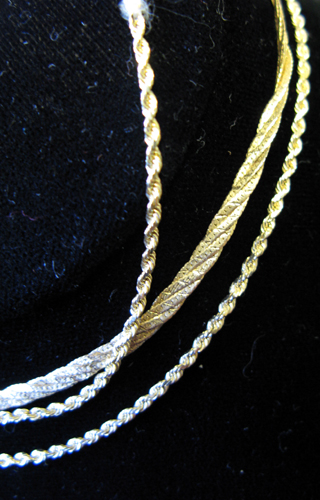 Appraisal: TWO FOURTEEN KARAT YELLOW GOLD CHAIN NECKLACES - and -