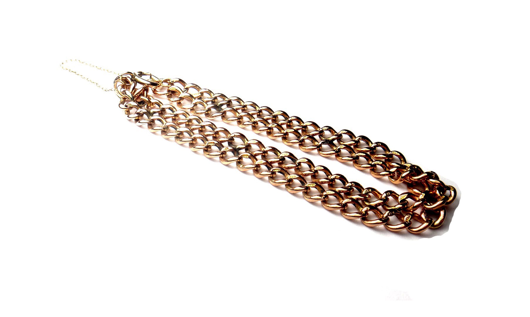 Appraisal: A ct gold curb link bracelet in a two row