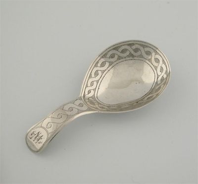 Appraisal: A George III spoon tear-drop bowl with a pricked rope-twist