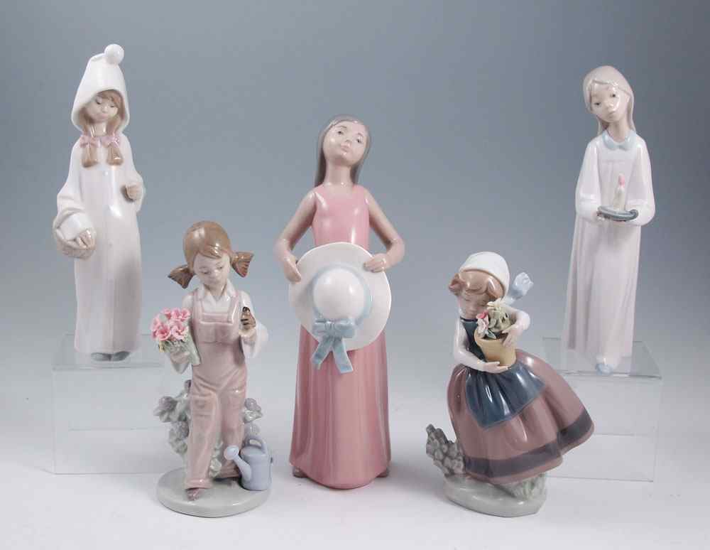 Appraisal: LLADRO GIRL FIGURES glazed figures to include GIRL WITH CANDLE