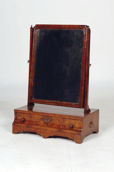 Appraisal: A GEORGE I WALNUT VENEERED DRESSING TABLE MIRROR with a