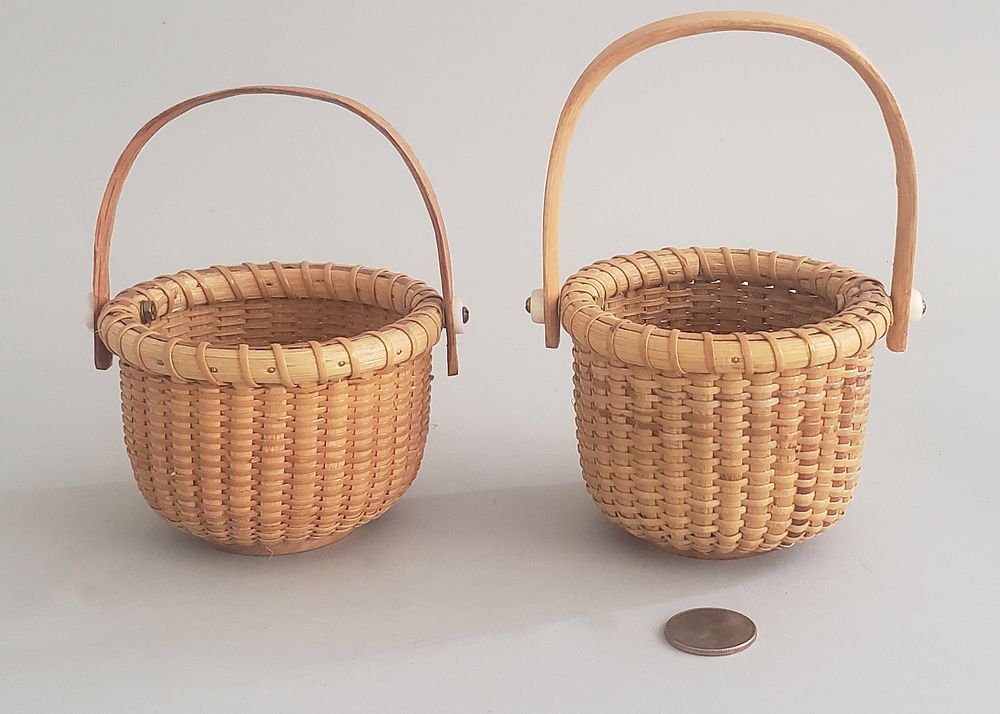 Appraisal: Two Henry Huyser Nantucket Swing Handle Baskets Two Henry Huyser