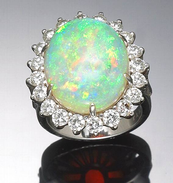 Appraisal: An opal diamond and k white gold ring estimated total