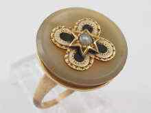 Appraisal: A yellow metal tests ct gold stone set ring with