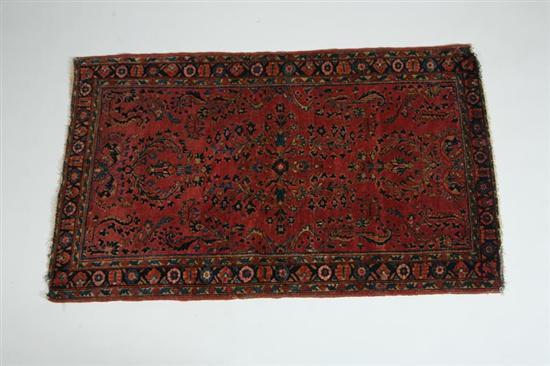 Appraisal: ORIENTAL RUG Sarouk Blue border and burgundy ground with floral