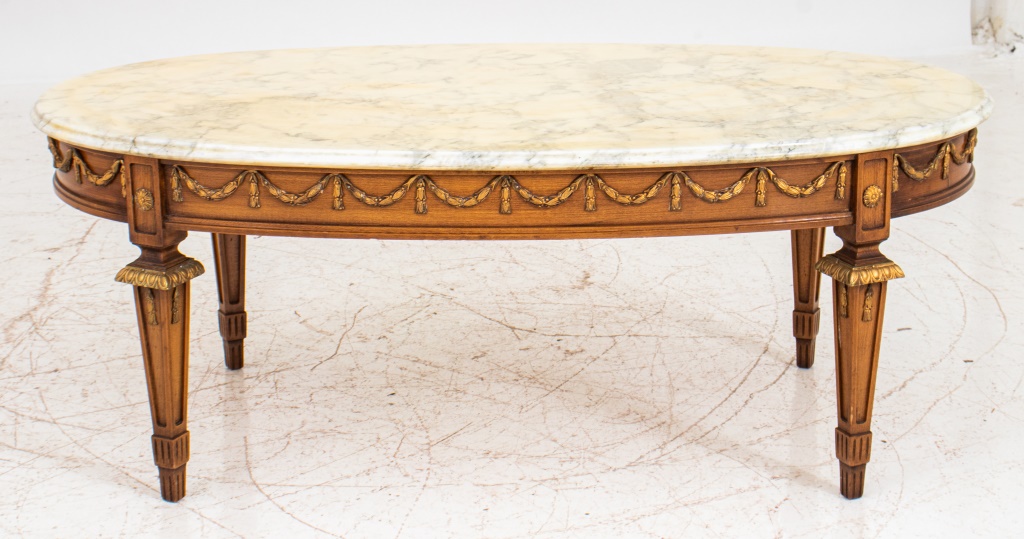 Appraisal: LOUIS XVI STYLE OVAL LOW TABLE Louis XVI style parcel