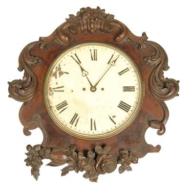 Appraisal: An Victorian carved mahogany wall clock with a twin fusee