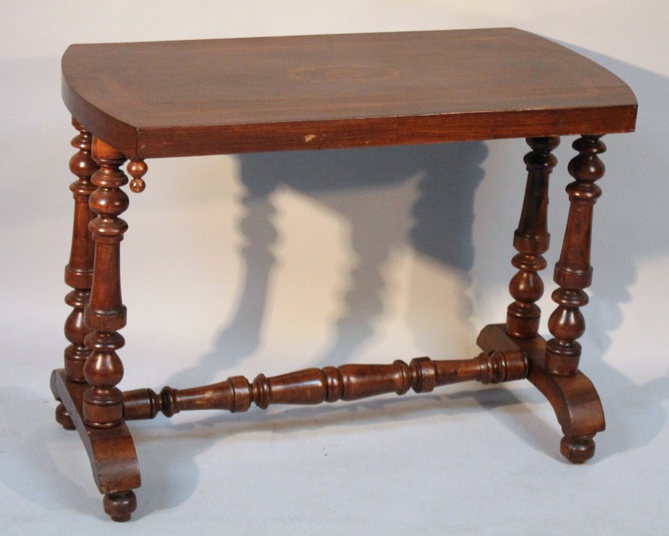 Appraisal: An early thC oak and mahogany side table the shaped