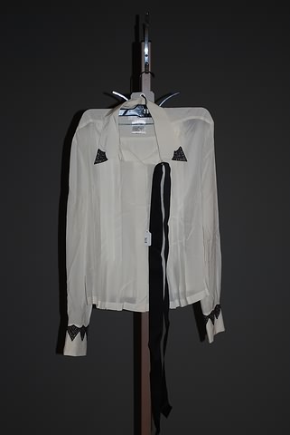 Appraisal: Chanel silk long sleeve blouse button down collar with beaded