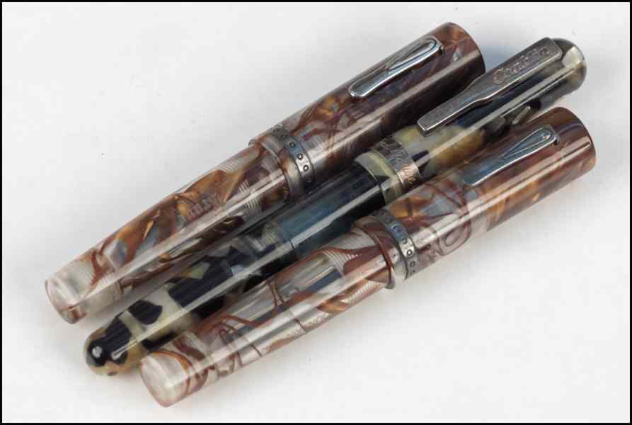 Appraisal: TWO KRONE KARAT GOLD AND RESIN FOUNTAIN PENS Together with