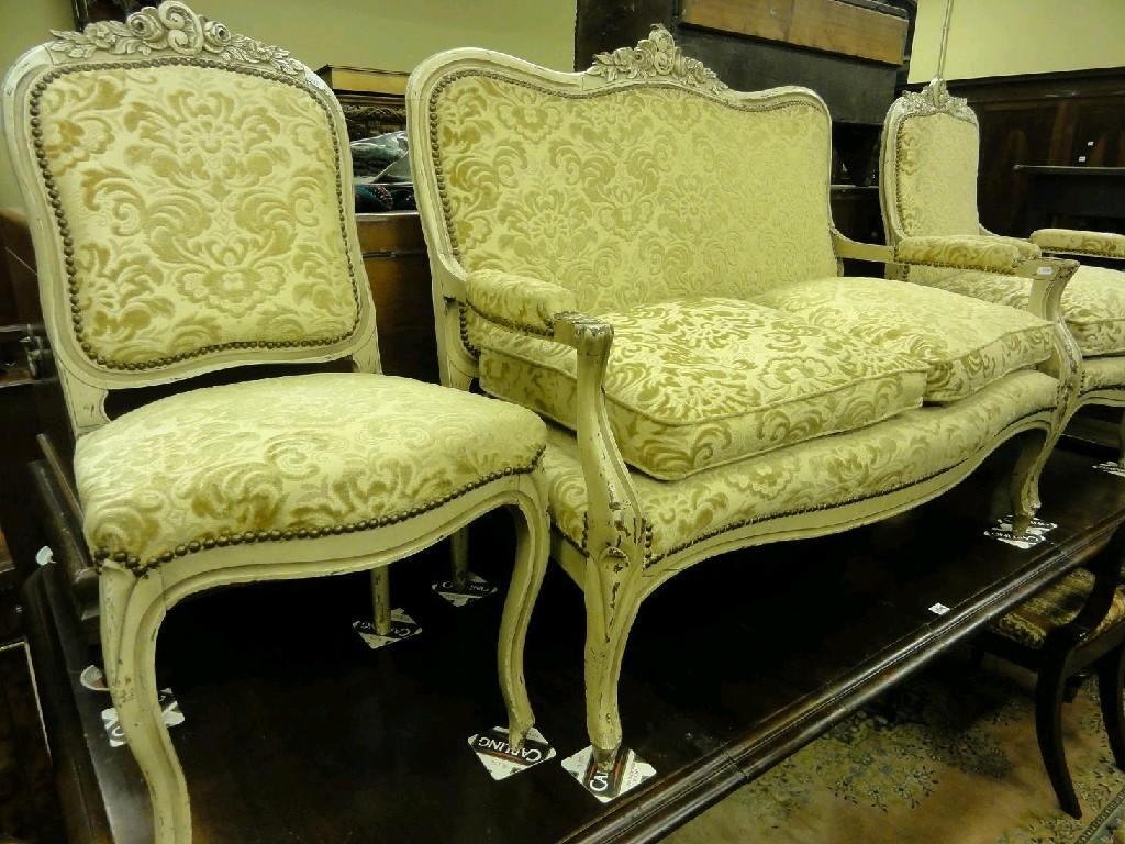 Appraisal: A continental three piece salon suite comprising two seat settee