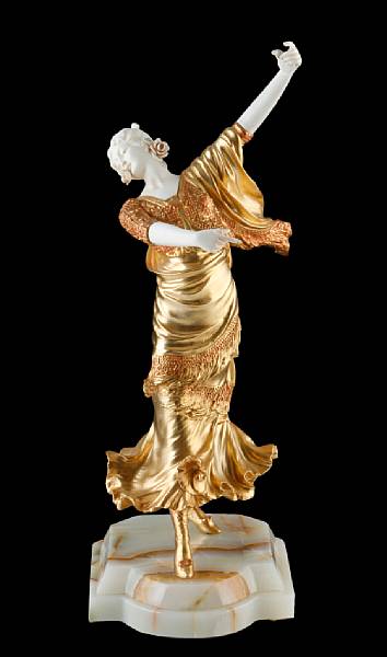 Appraisal: A gilt-bronze and ivory figure of a dancer late th