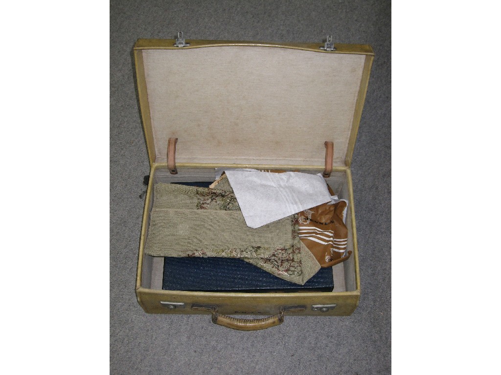 Appraisal: Lot comprising cream suitcase and a sewing case