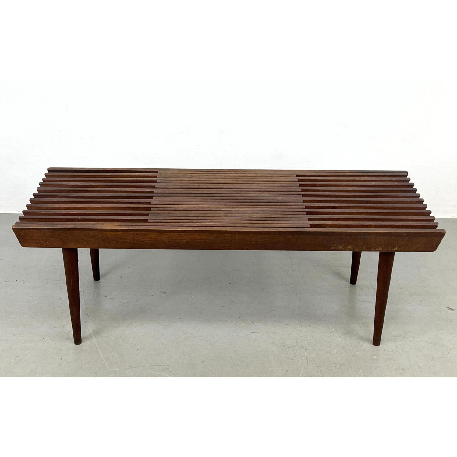 Appraisal: Expandable Modernist Slat Bench Table Tapered peg legs Dimensions H