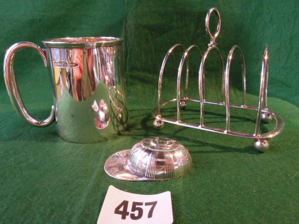 Appraisal: A silver Walker Hall christening cup a silver toast rack