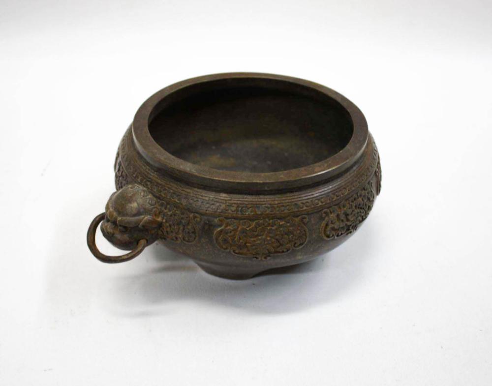 Appraisal: CHINESE FOOTED BRONZE CENSER circular form of low profile with