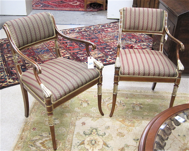 Appraisal: A PAIR OF REGENCY STYLE SILVER-GILT MAHOGANY ARMCHAIRS Karges Furniture