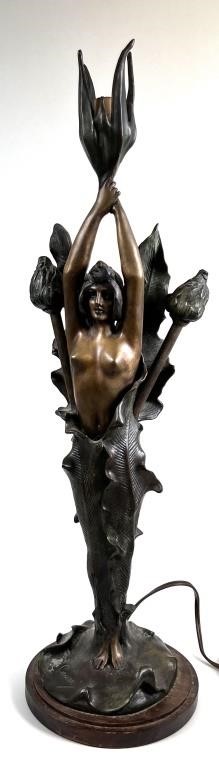 Appraisal: Art Nouveau lamp depicting a female figure in center of