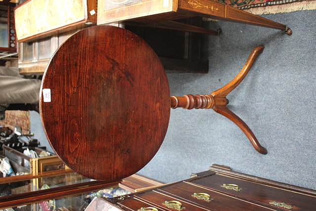 Appraisal: AN ANTIQUE PINE AND MAHOGANY CIRCULAR TILT TOP OCCASIONAL TABLE